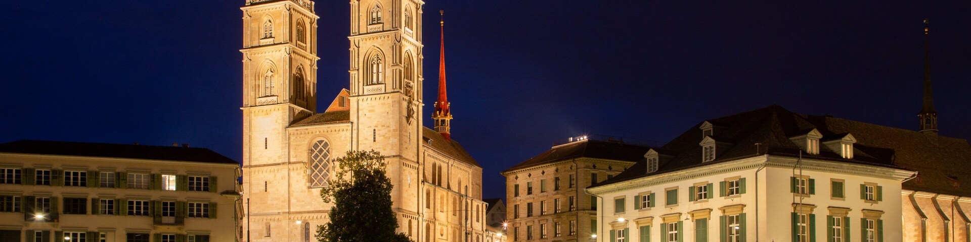Grossmuenster featuring night scenes, heritage architecture and a church or cathedral