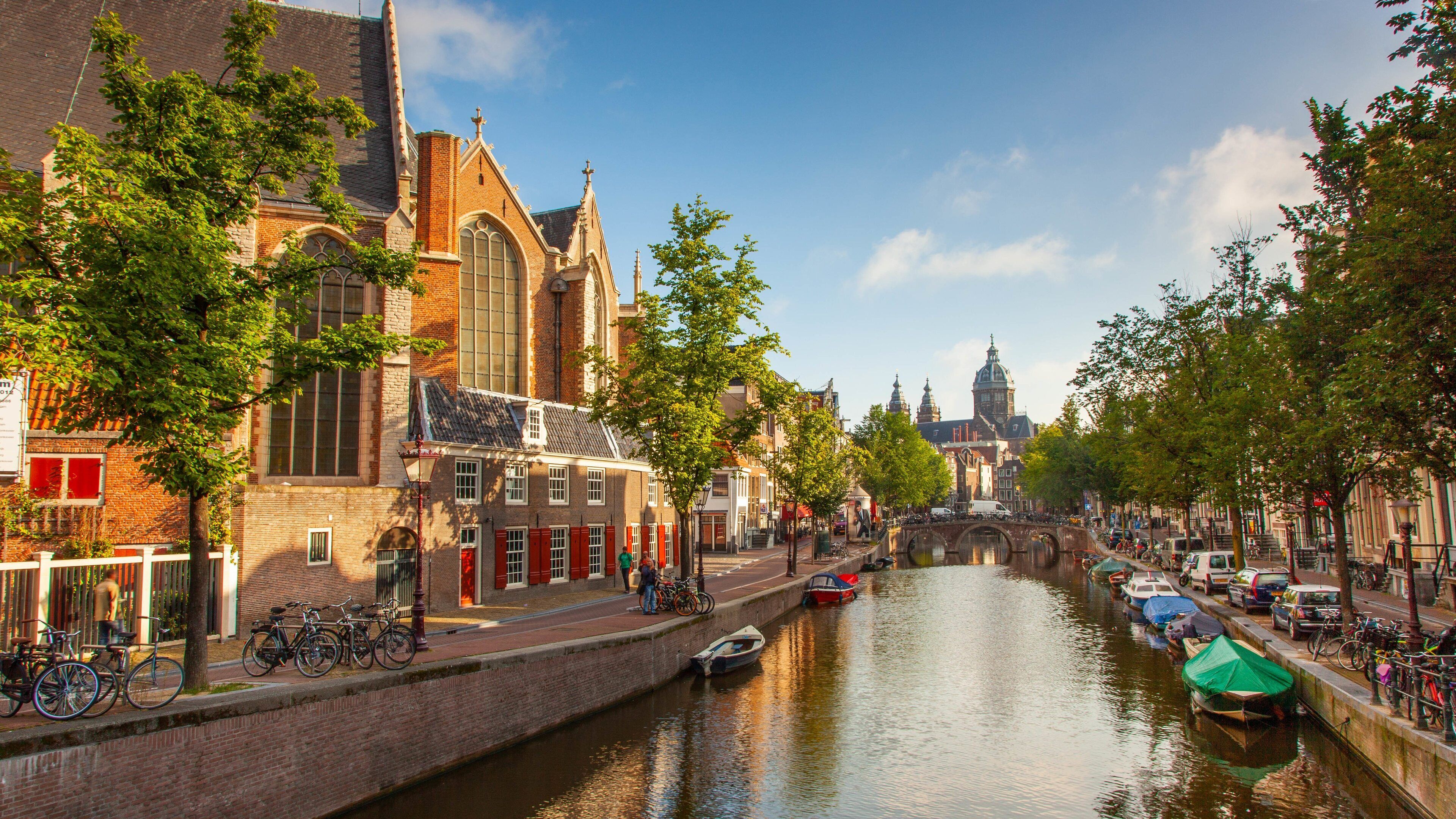 Red Light District featuring a city and a river or creek