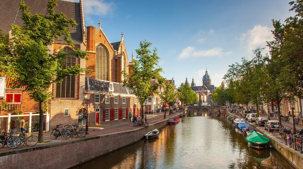 Red Light District featuring a city and a river or creek