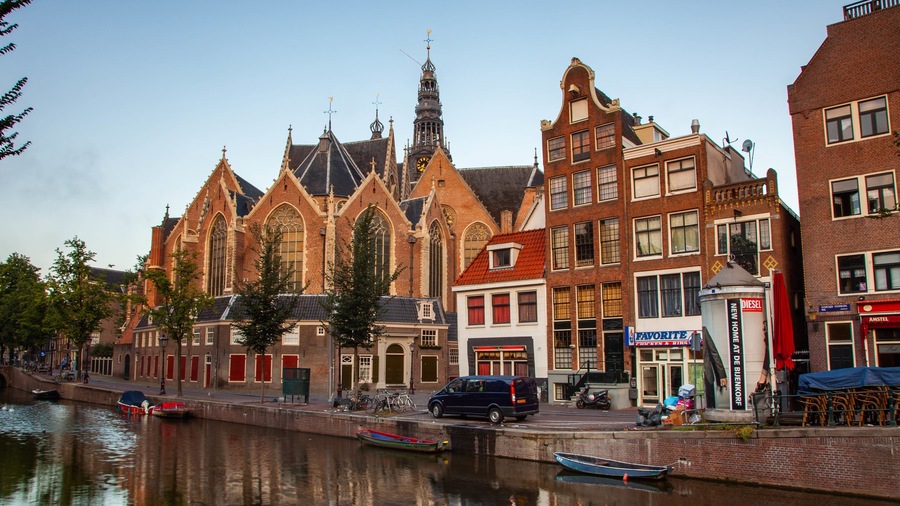 Red Light District featuring a river or creek and heritage architecture