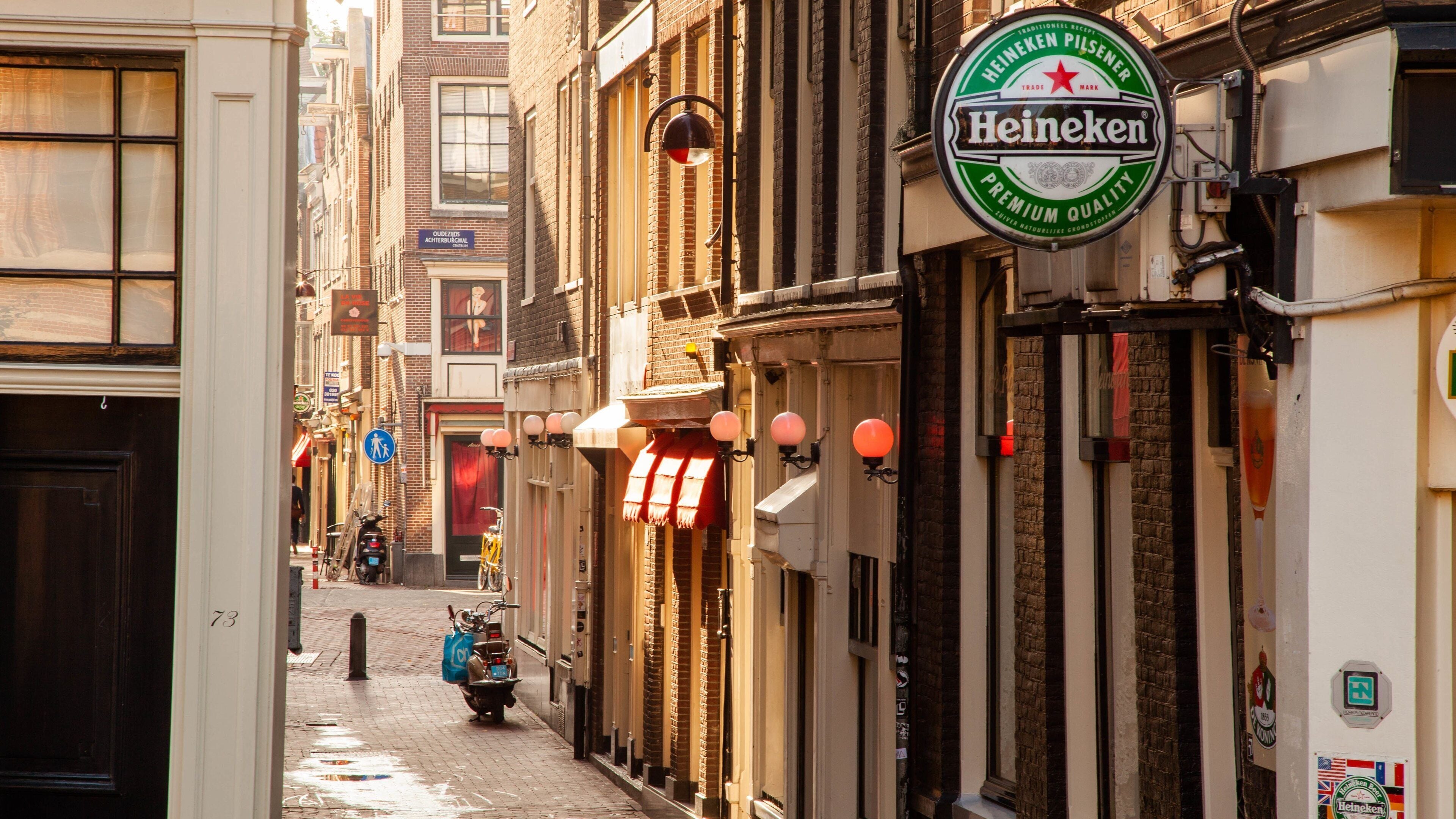 Red Light District featuring a city, signage and heritage elements