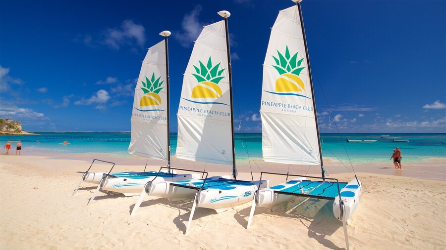 Antigua featuring general coastal views, signage and a sandy beach