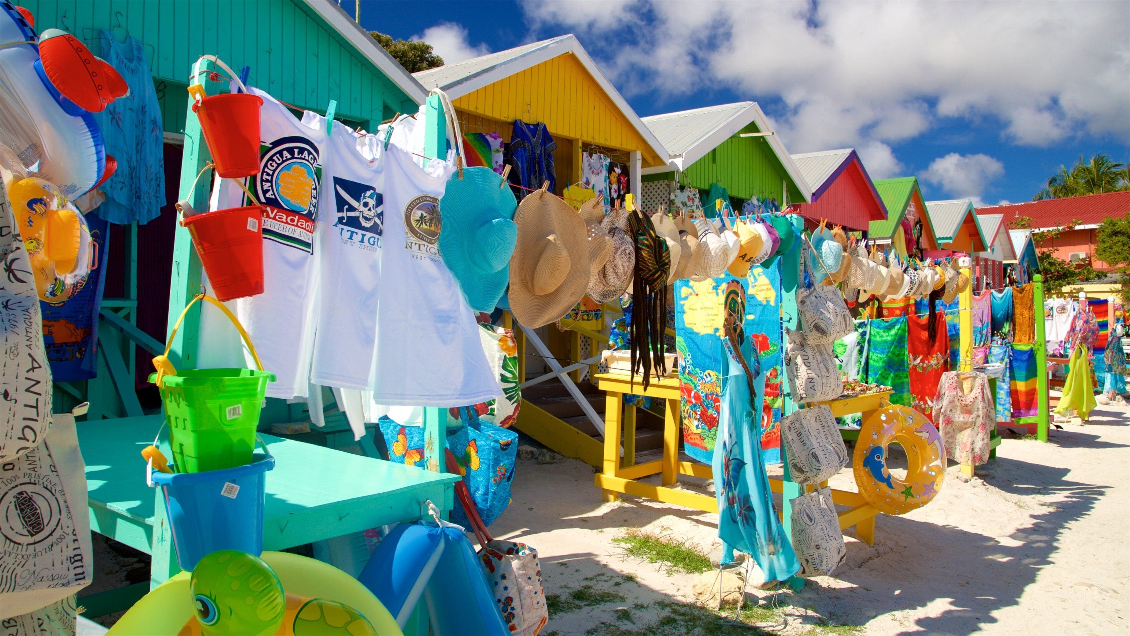 Long Bay showing a sandy beach and markets