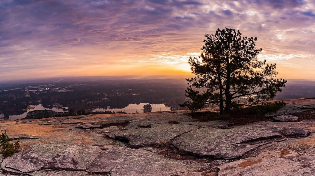 The top of Stone Mountain offers stunning views in all directions. This particular morning was wrapped in the cool pre-dawn air. As the sun broke over the horizon, a warm rush of light raced across the landscape. It was the reward for the brief one mile hike that rises 700 feet, 1,685 feet above sea level.
