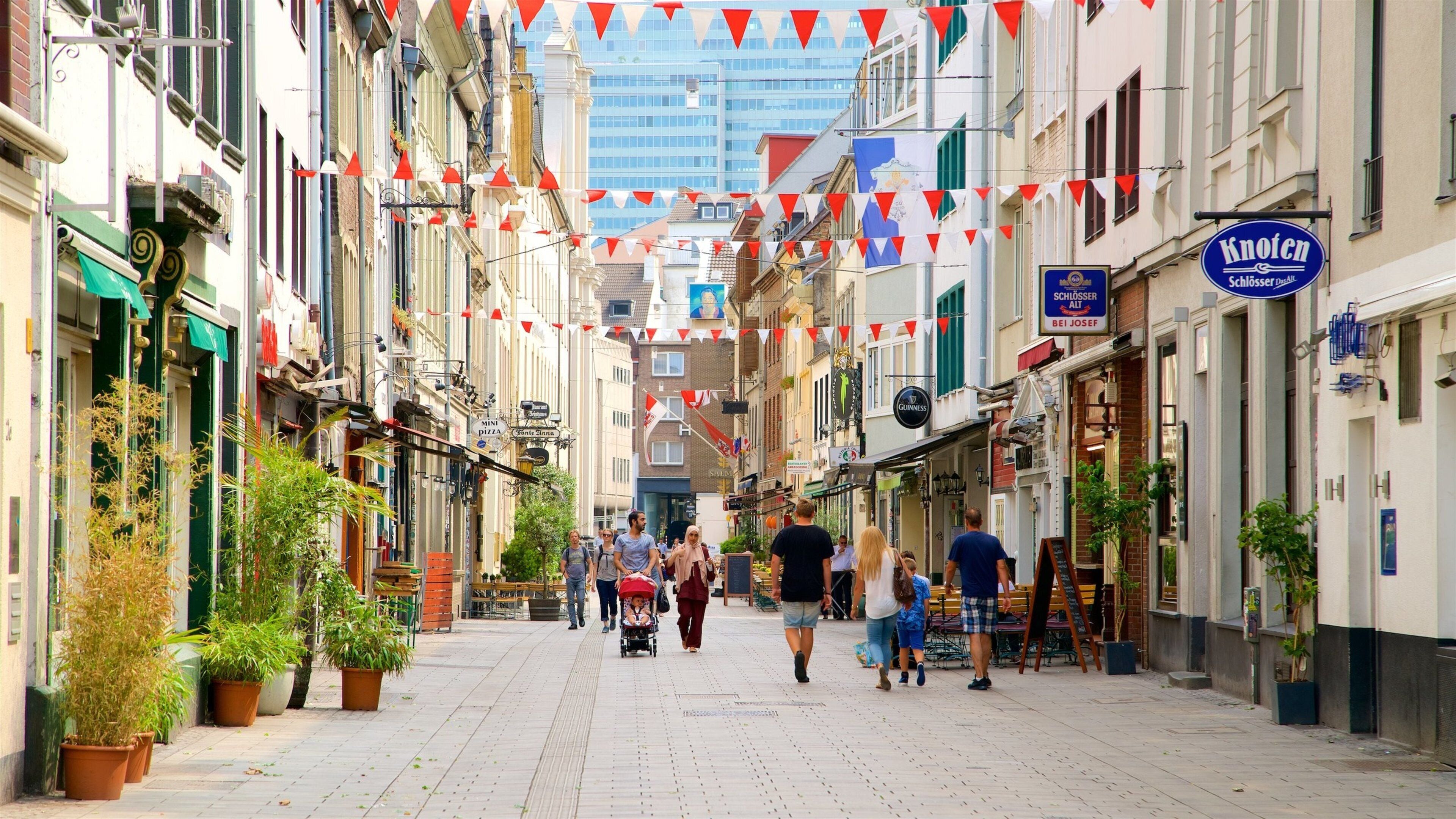 Düsseldorf Old Town as well as a small group of people