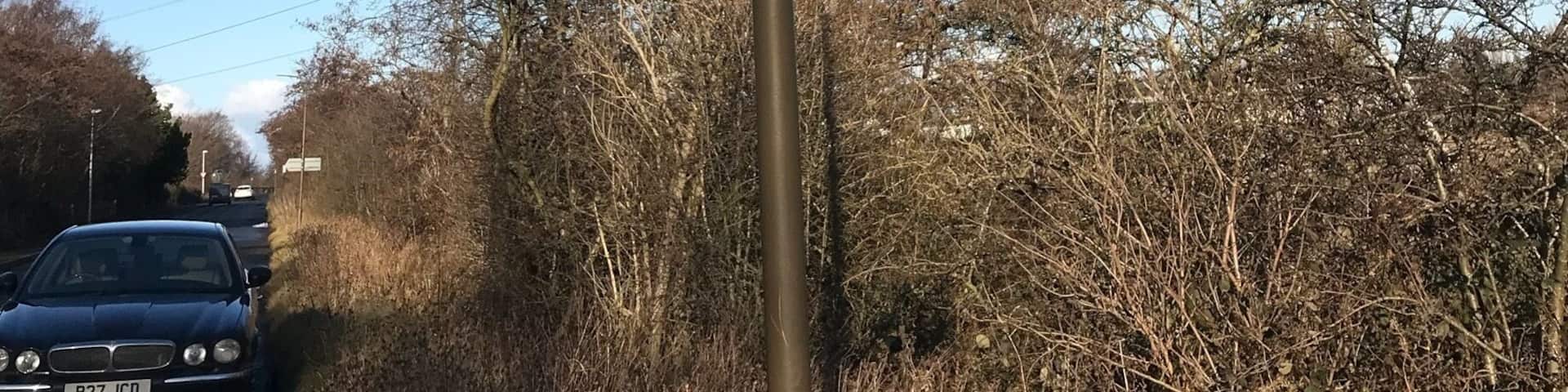 Signpost in English and Scots Gaelic indicating the location of the 1745 Battle of Prestonpans (it had previously been known as the Battle of Gledsmuir and The Battle of Tranent).