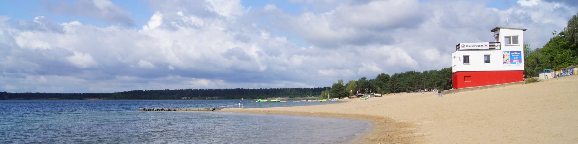 View west at main beach of lake Helenesee in Frankfurt (Oder), Brandenburg, Germany