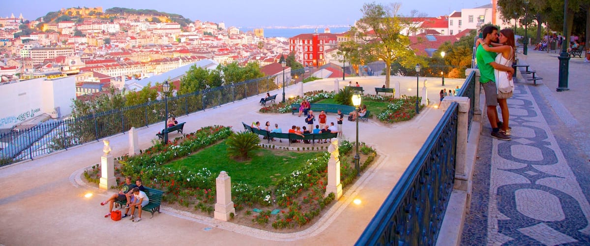 Chiado which includes views and a sunset as well as a couple