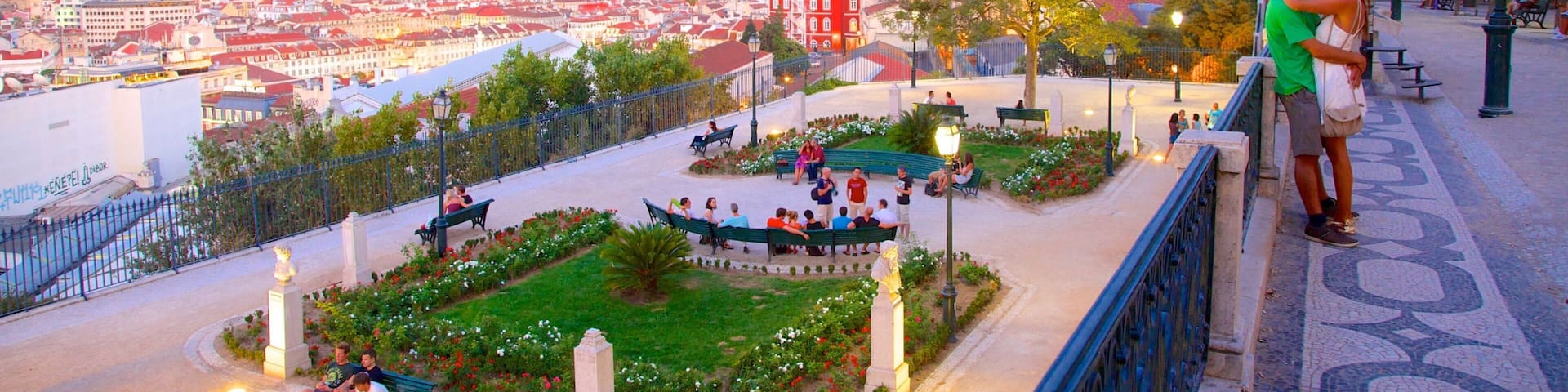 Chiado showing a sunset and views as well as a couple