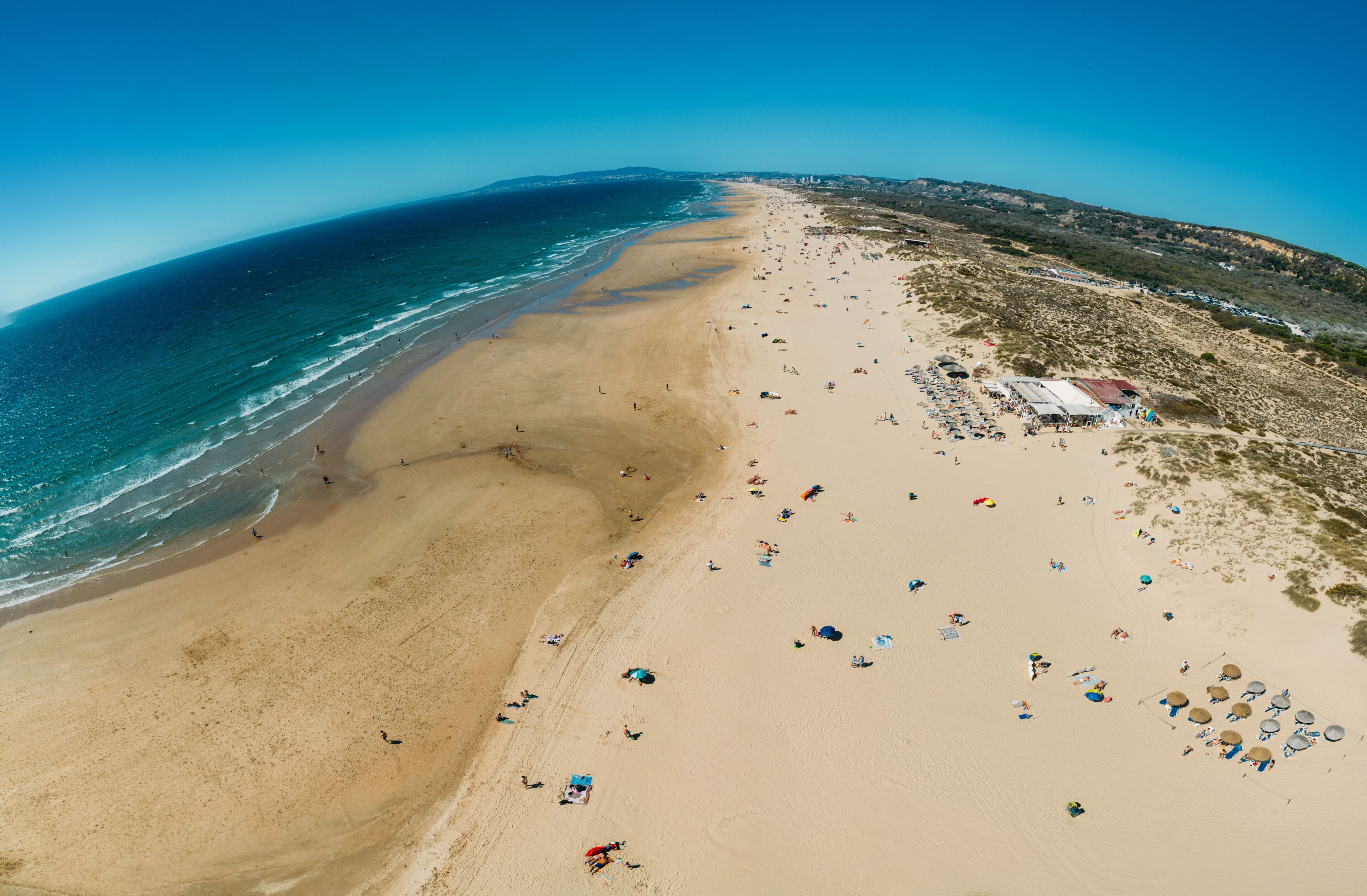 Aerial view of Caparica Beach in Almada District, Greater Lisbon, Portugal on a summer day