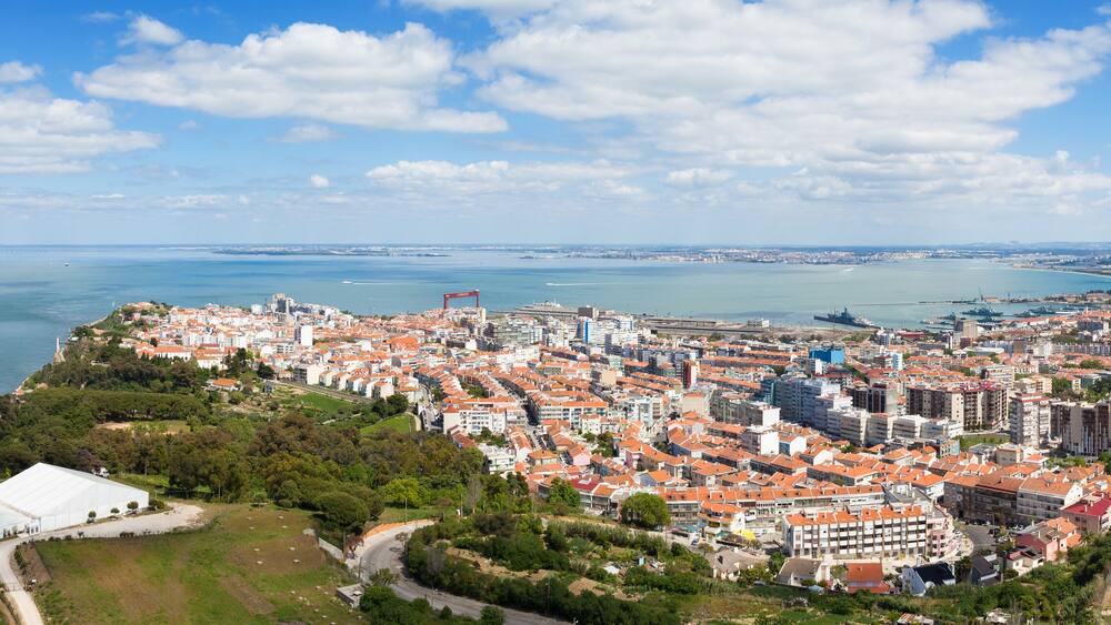 Panoramic aerial view of Almada rooftop from Christo Rei statue