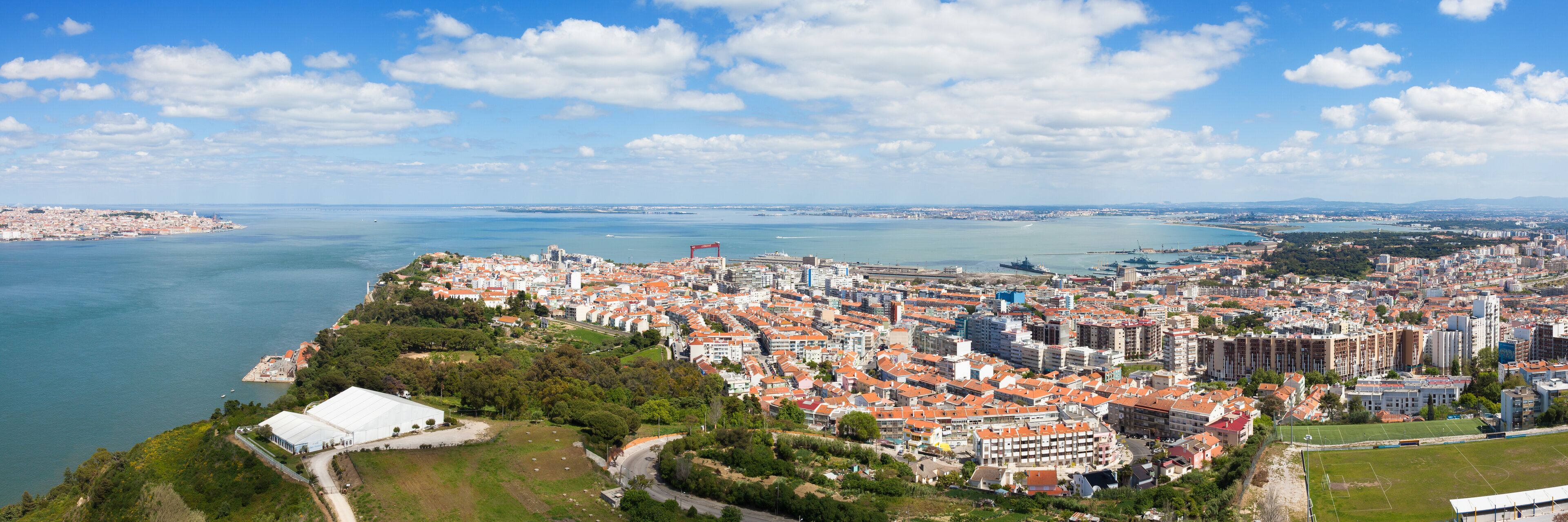 Panoramic aerial view of Almada rooftop from Christo Rei statue