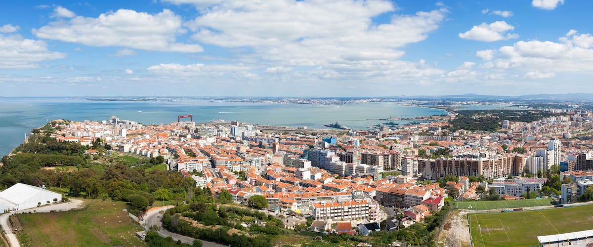 Panoramic aerial view of Almada rooftop from Christo Rei statue