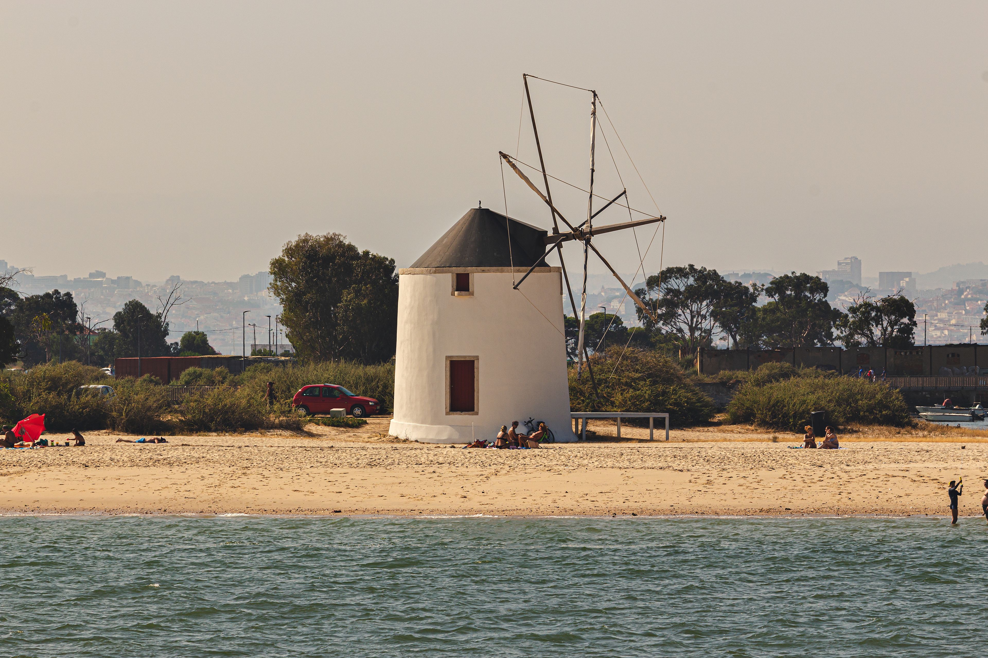 Alburrica windmills, estuary river windmills, landscape, Portugal