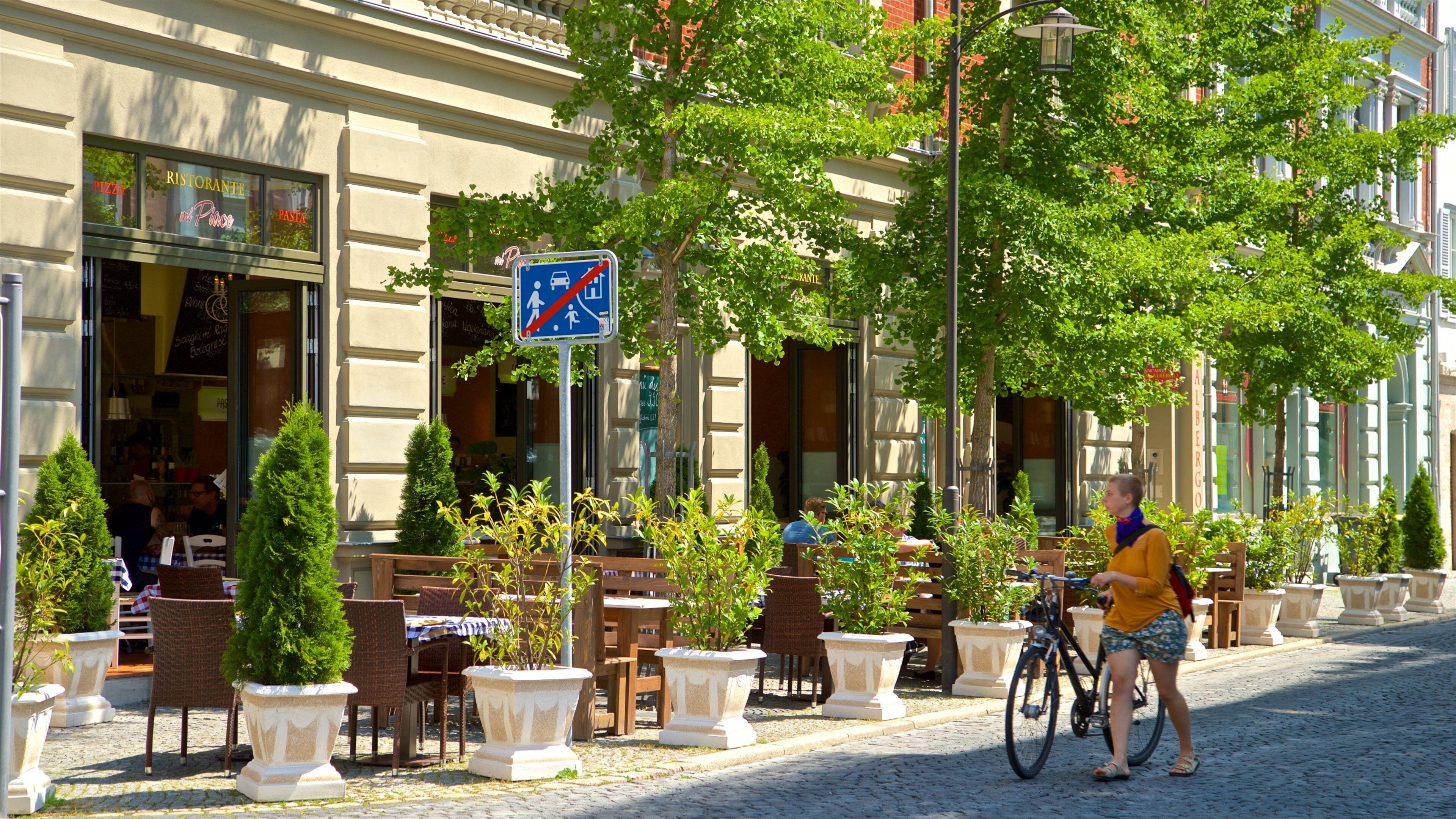 Weimar showing cycling as well as an individual female