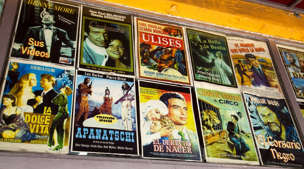 Colorful movie posters display vibrant culture in Little Havana, Miami, showcasing Latin American cinema and art