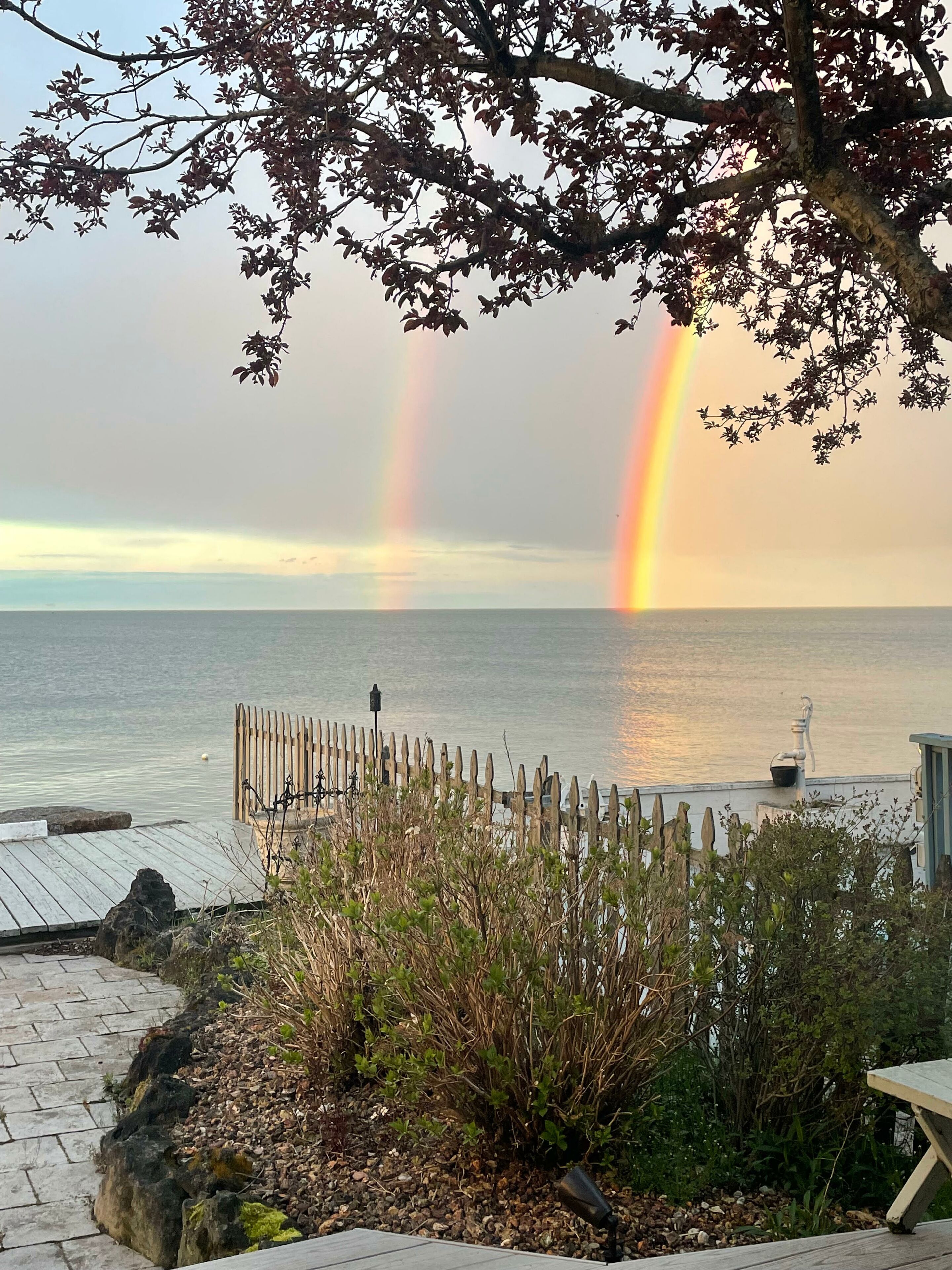 double rainbow over the beach