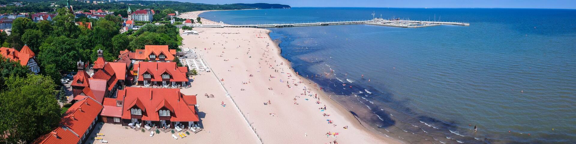 Panorama of the Baltic sea coastline with wooden pier in Sopot, Poland