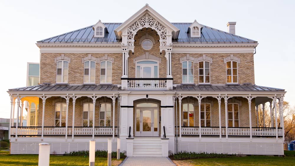 Horizontal frontal view of the 1893 italianate two story Notre-Dame-de-l’Annonciation presbytery in L’Ancienne-Lorette, small town in the vicinity of Quebec City, Quebec, Canada