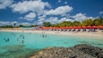Mullet Bay Beach featuring swimming, tropical scenes and a beach
