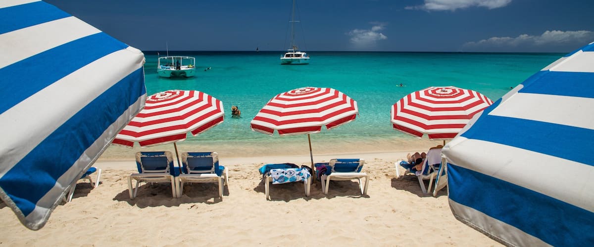 Mullet Bay Beach which includes a beach, tropical scenes and general coastal views