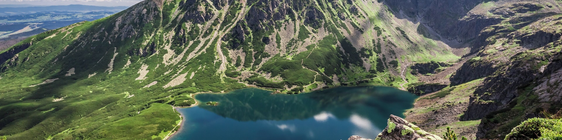 Wonderful sunrise at Czarny Staw Gasienicowy in summer, Tatras