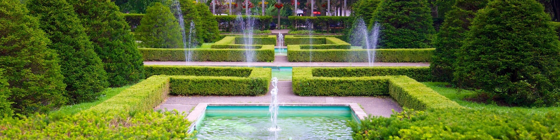 High Park which includes a fountain, a park and a pond