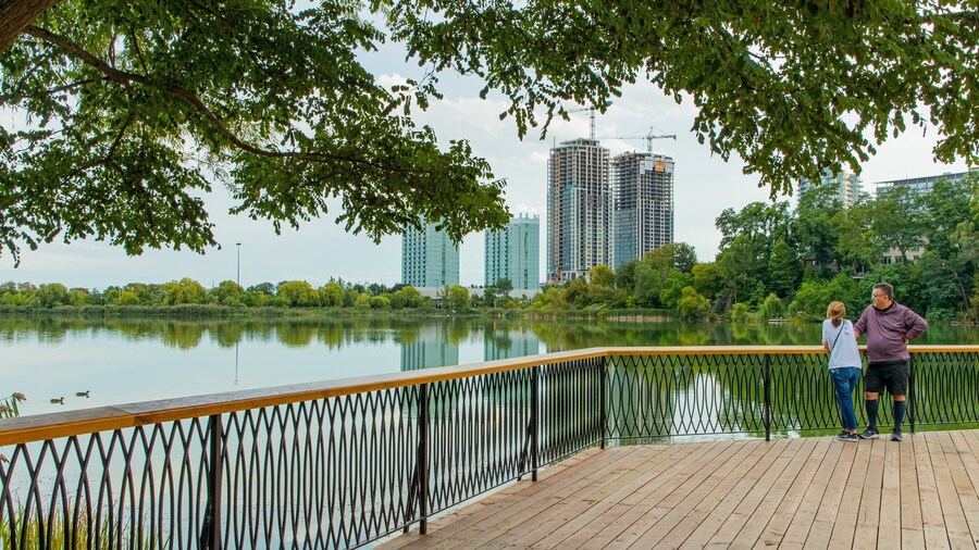 High Park featuring a lake or waterhole as well as a couple