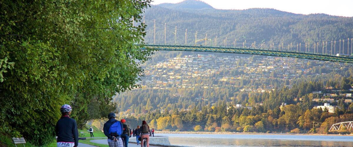 Stanley Park featuring cycling, a river or creek and a bridge