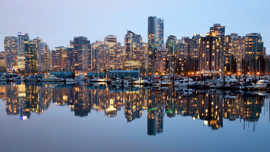 Stanley Park featuring a bay or harbor, a city and a skyscraper