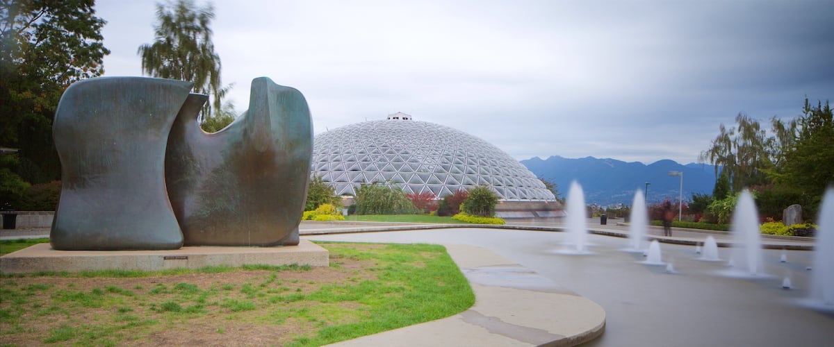 Queen Elizabeth Park featuring a fountain and a statue or sculpture
