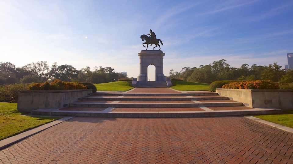 Statue of a rider on horseback stands proudly in Hermann Park, Houston under clear skies