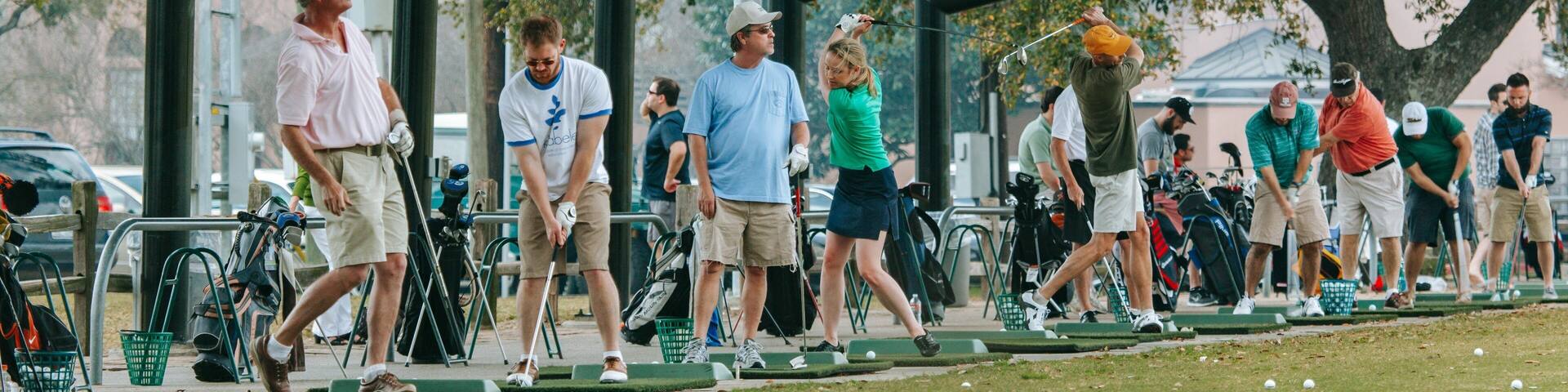 Memorial Park featuring golf as well as a small group of people