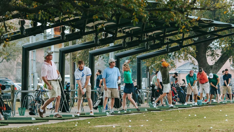 Memorial Park featuring golf as well as a small group of people