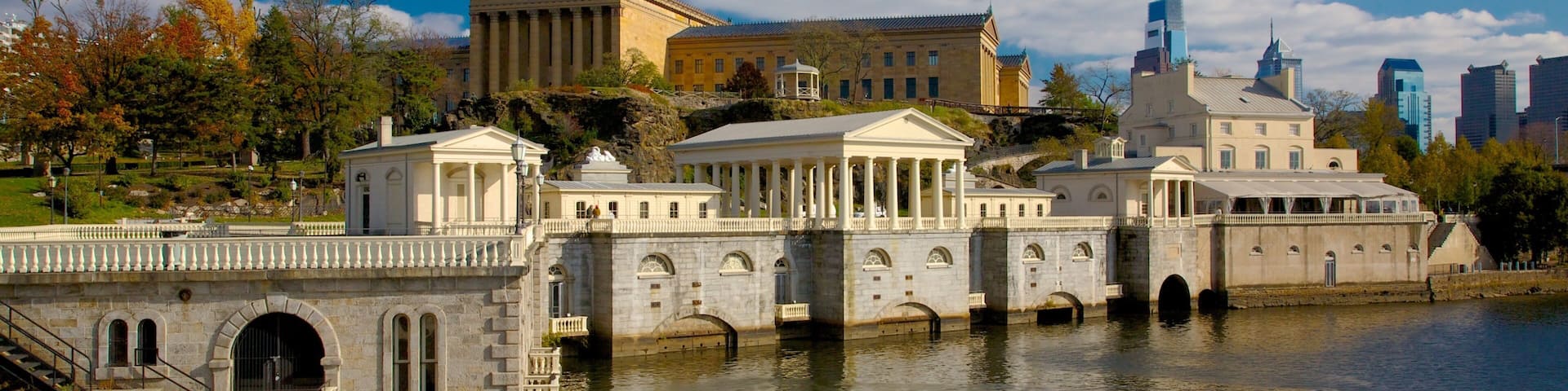 Exploring Fairmount Park along the Schuylkill River in Philadelphia with historic architecture and beautiful greenery