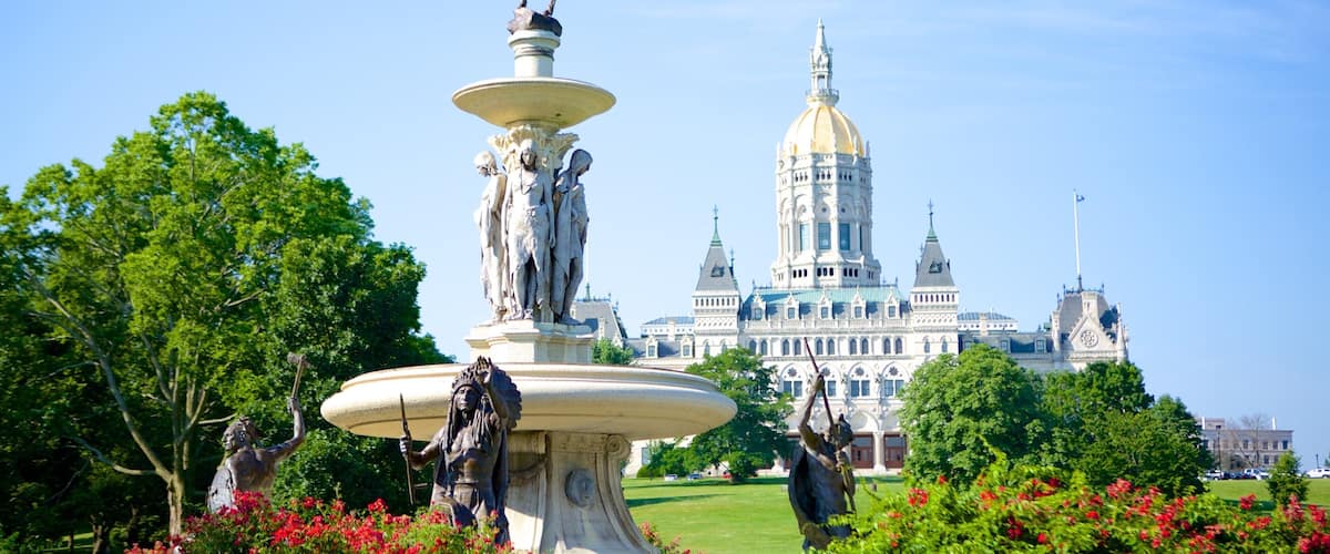 Bushnell Park which includes a statue or sculpture and a park