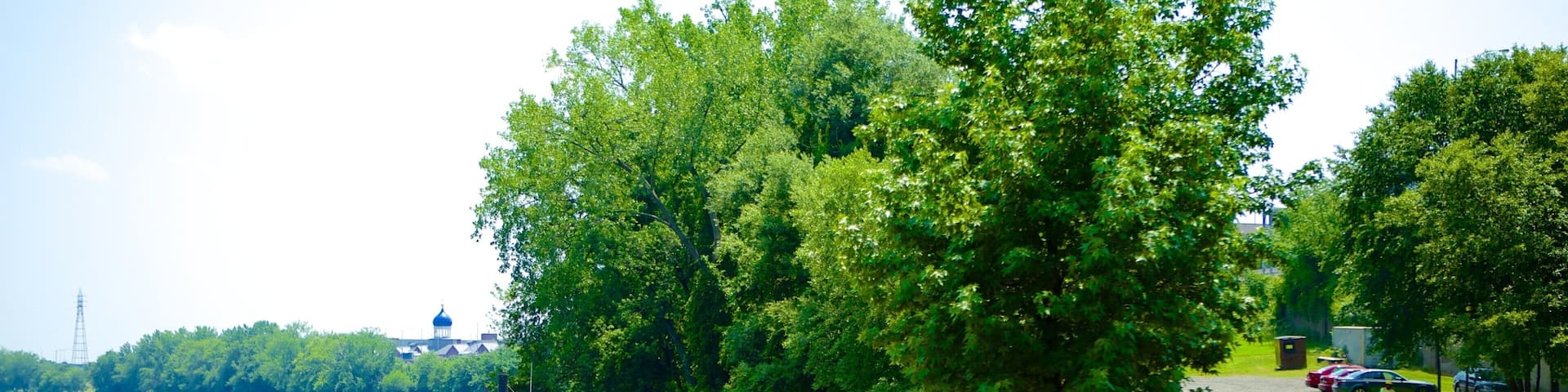 Riverside Park featuring a park and a river or creek