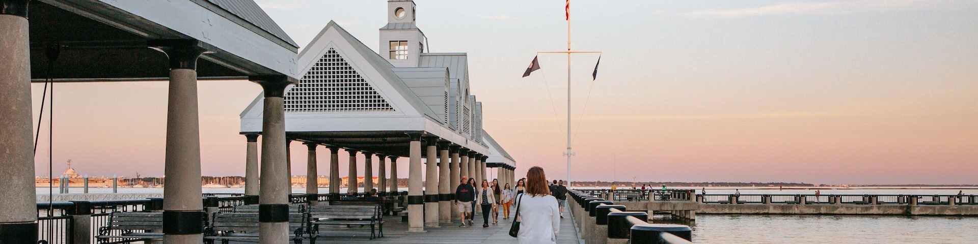 Waterfront Park showing a sunset as well as an individual femail