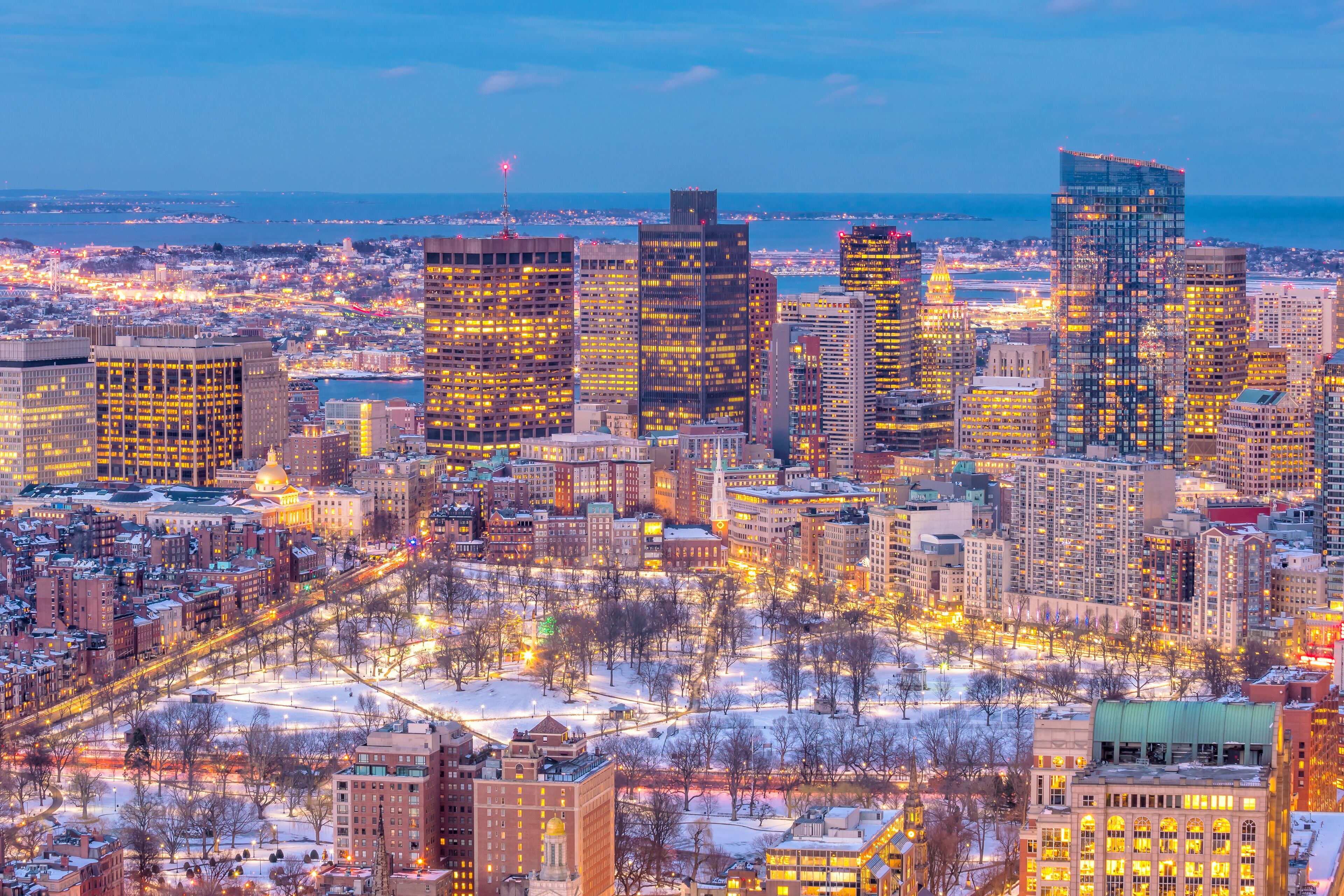 Aerial view of Boston skyline and Boston Common park in Massachusetts, USA at sunset in winter