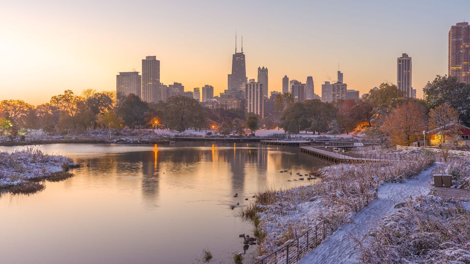 Chicago downtown skyline Lincoln Park sunrise morning pond snow