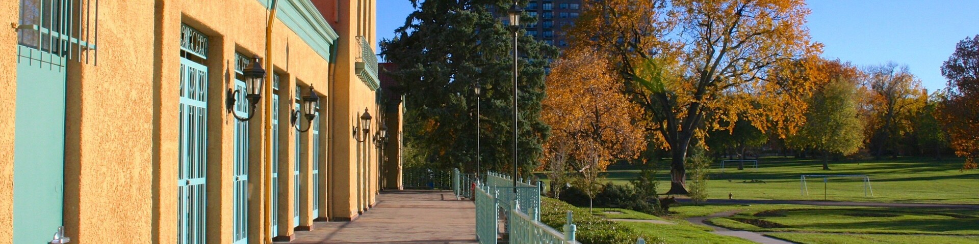Scenic view of City Park in Denver showcasing vibrant fall colors and historic architecture