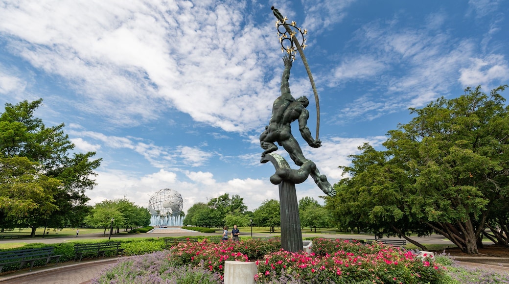 Flushing Meadows-Corona Park featuring flowers, a statue or sculpture and a park