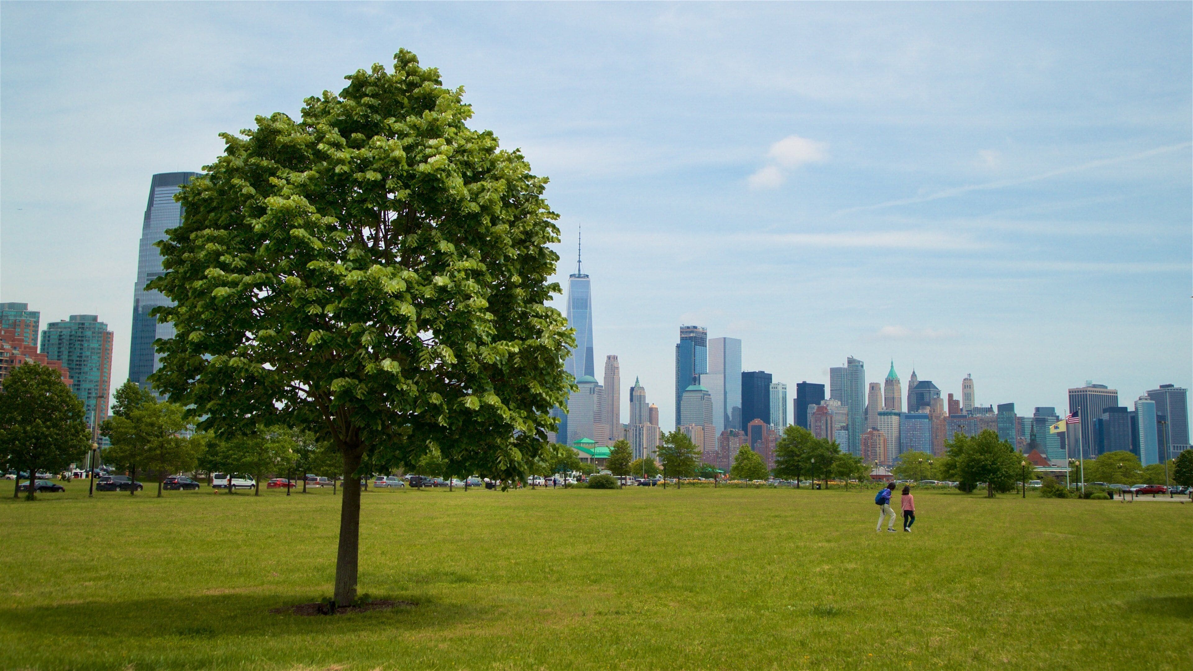 Liberty State Park which includes a city, a high-rise building and a park