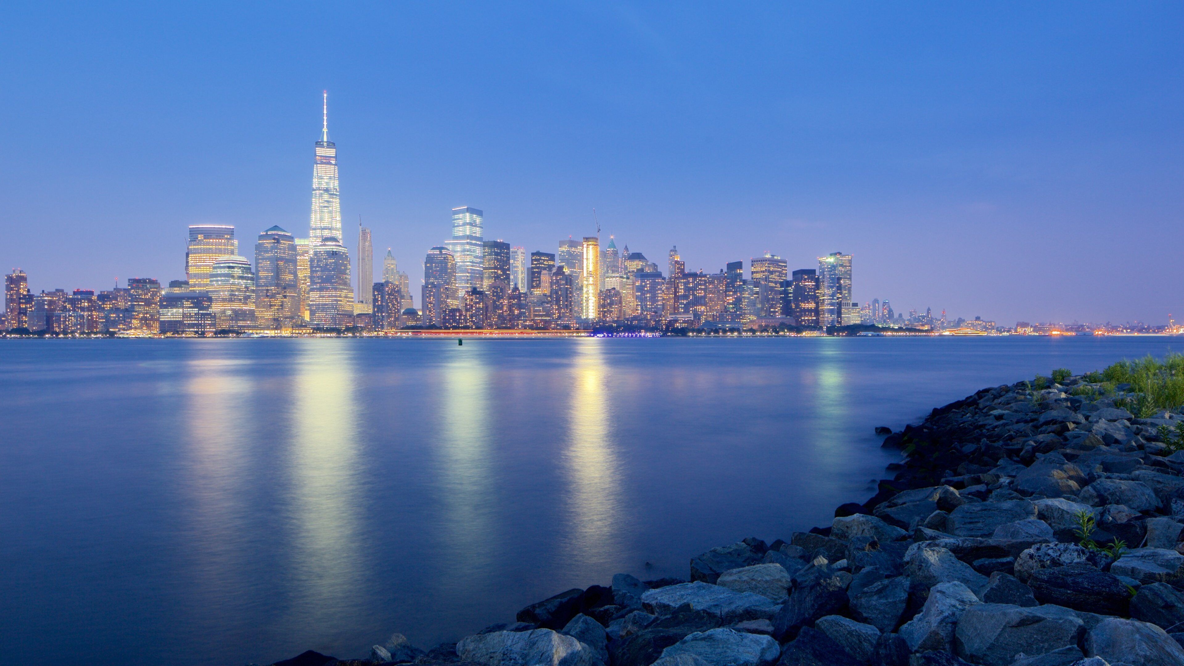 Liberty State Park featuring a sunset, a skyscraper and a city