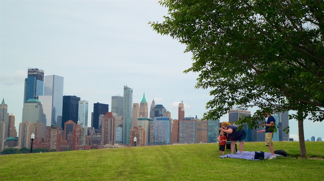 Liberty State Park which includes a skyscraper, a garden and a city