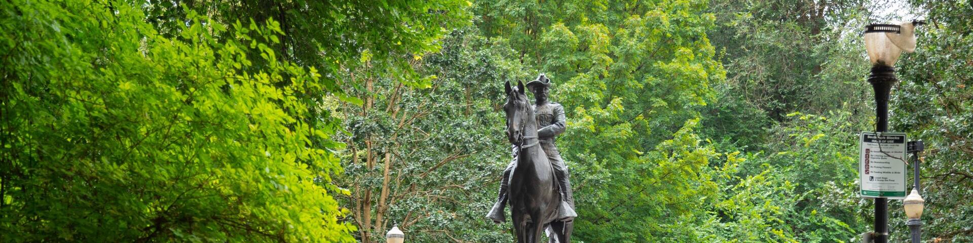 South Park Blocks featuring a garden and a statue or sculpture