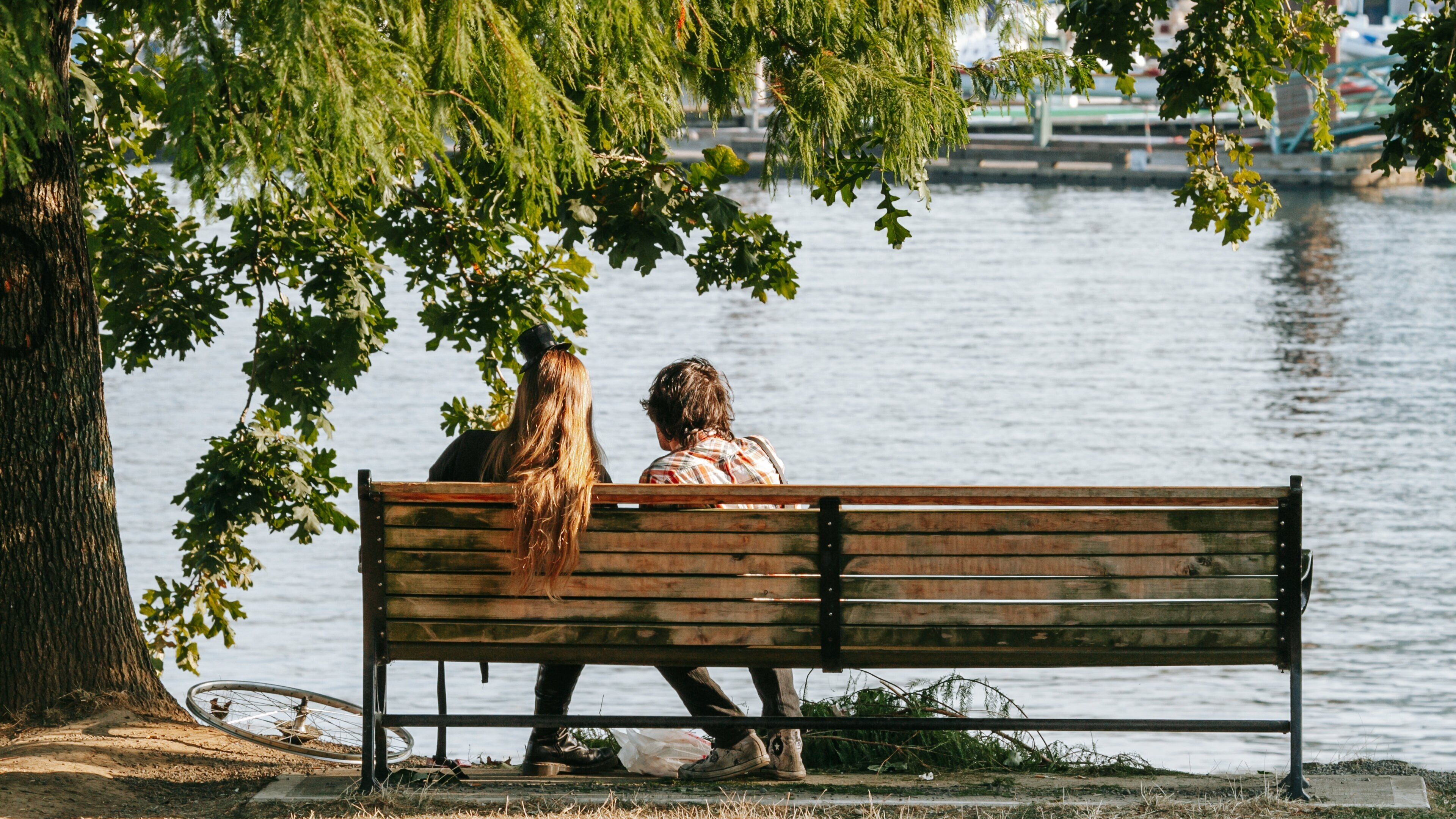 Tom McCall Waterfront Park showing a pond and a park as well as a couple