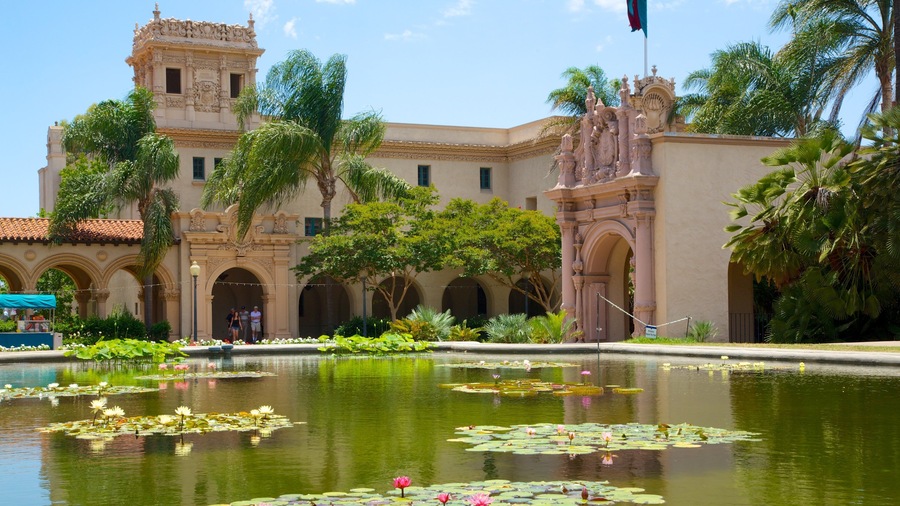 Balboa Park featuring heritage architecture, a pond and a garden