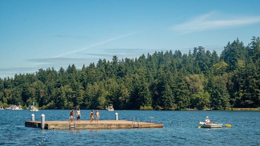 Seward Park showing a lake or waterhole and boating as well as a small group of people