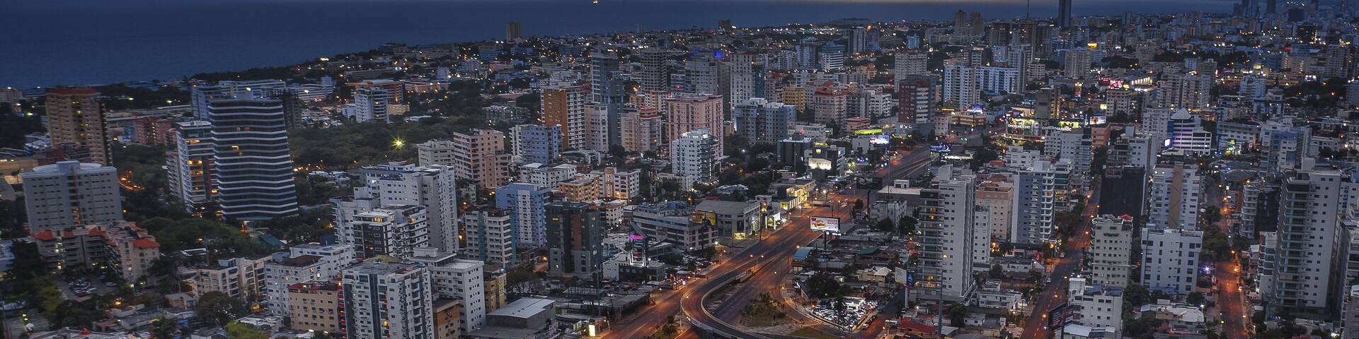 Centro Olimpico Juan Pablo Duarte surrounded by buildings in Santo Domingo, the Dominican Republic
